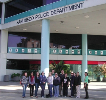 Club members in front of San Diego Police Dept. building
